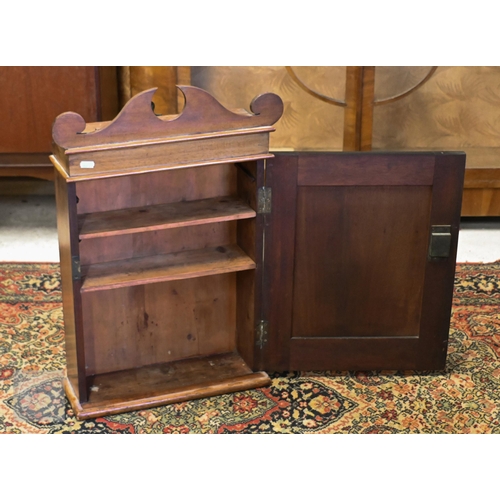 166 - A Victorian mahogany medicine cupboard with panelled door enclosing shelved interior, 40 x 14 x 62 c... 