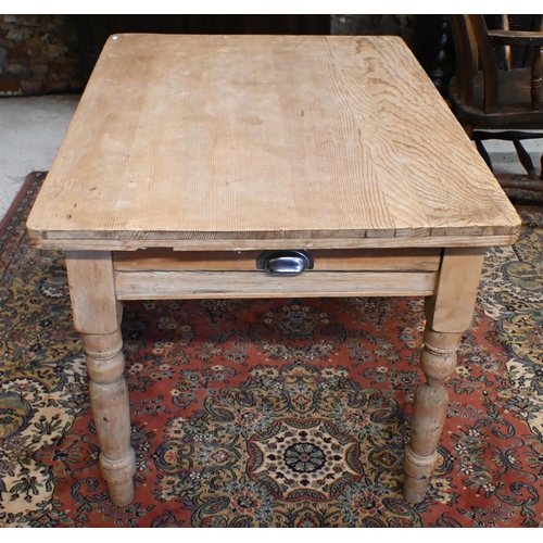 172 - A vintage pine kitchen dining table with end drawer on turned supports, 106 x 80 x 72 cm to/w harleq... 