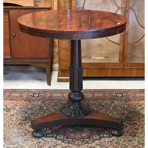 177 - A 19th century rosewood circular occasional table on concave platform base and bun feet, 68 cm diam ... 