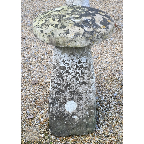 18 - A companion pair of antique hand cut staddle stones, the square tapering bases with circular caps (2... 