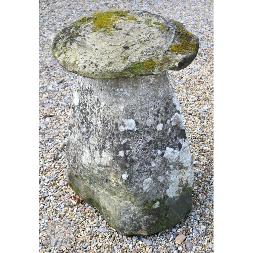 18 - A companion pair of antique hand cut staddle stones, the square tapering bases with circular caps (2... 