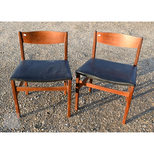 183 - A set of four mid-century Robert Heritage for Archie Shine teak framed dining chairs with black viny... 