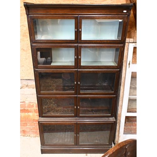 185 - A Globe Wernicke style stained oak barrister's bookcase with five pairs of glazed doors (does not se... 