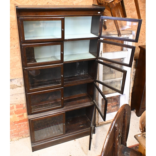 185 - A Globe Wernicke style stained oak barrister's bookcase with five pairs of glazed doors (does not se... 