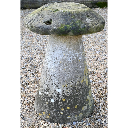 19 - A single antique hand cut staddle stone, of circular tapering form with circular cap