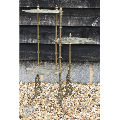 192 - A vintage brass three-tier plant stand cast with butterflies to/w a large pair of deer antlers (2)