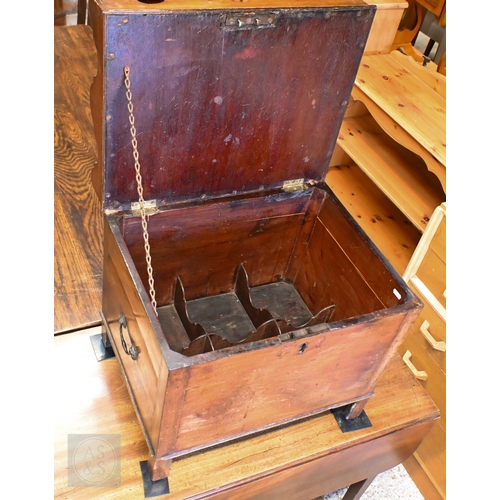 193 - A 19th century mahogany cellarette with compartmentalized hinged top enclosing fitted interior on sq... 