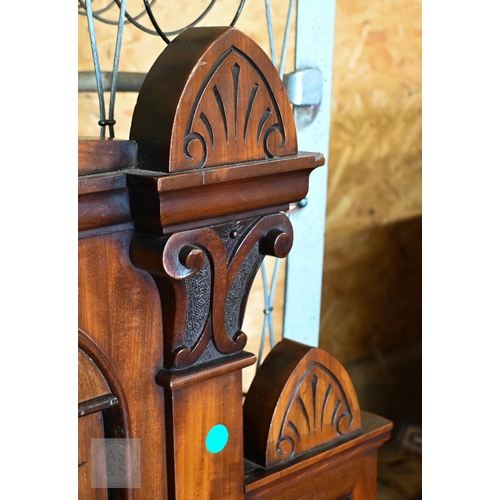 194 - A 19th century mahogany double bed with panelled headboard and curved footboard, scroll carved rails... 