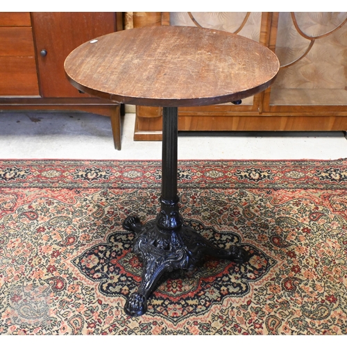 195 - Caskell Chambers Ltd, Liverpool Victorian cast iron bar table with stained hardwood top, 90 cm x 45 ... 