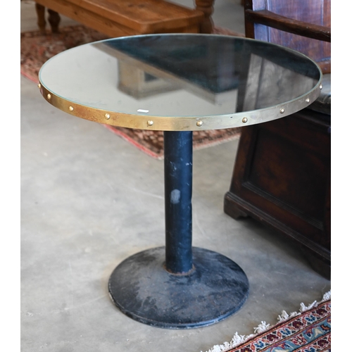 196 - Pair of circular mirror-topped tables with heavy cast iron bases, 70 cm dia x 64 cm h (2)