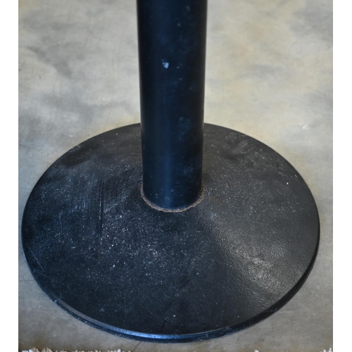 196 - Pair of circular mirror-topped tables with heavy cast iron bases, 70 cm dia x 64 cm h (2)