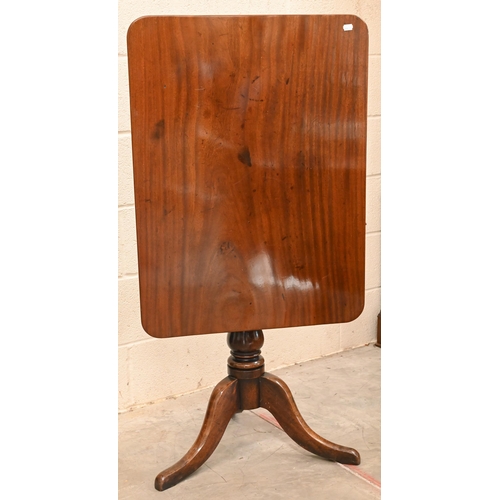 199 - A 19th century mahogany tilt top table on turned column and triform supports, 80 x 60 x 74 cm h