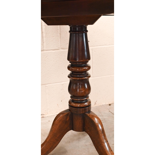 199 - A 19th century mahogany tilt top table on turned column and triform supports, 80 x 60 x 74 cm h