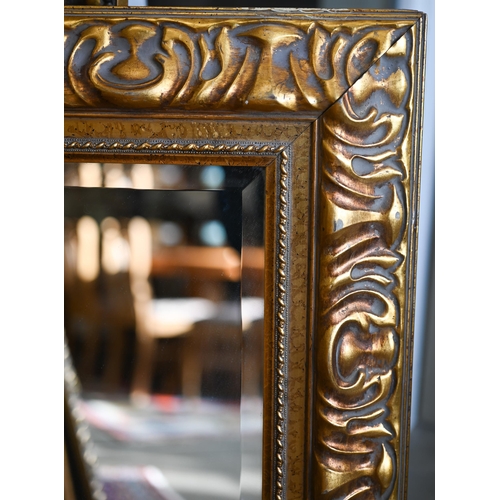 201 - Four graduating wall mirrors with moulded foliate gilt frames, two with bevelled plate and one havin... 