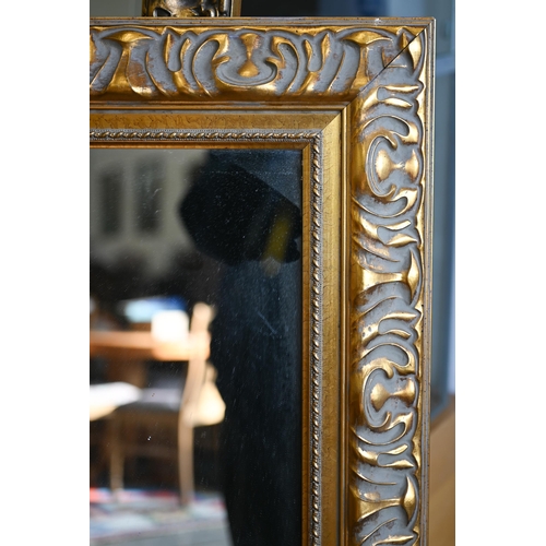 201 - Four graduating wall mirrors with moulded foliate gilt frames, two with bevelled plate and one havin... 