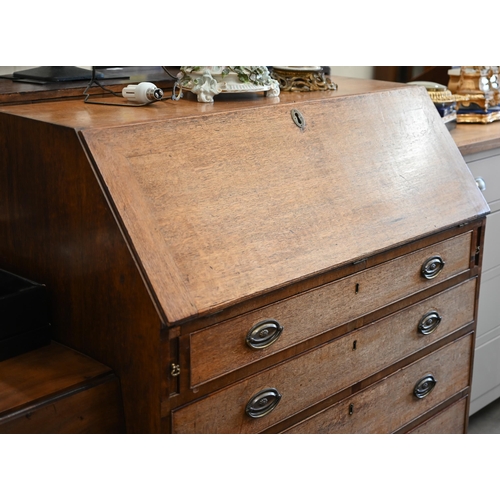 214 - A George III oak fall front bureau with fitted interior over four long graduated drawers, 106 x 50 x... 