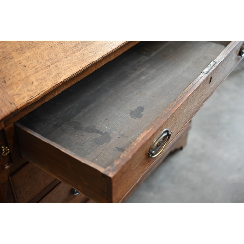 214 - A George III oak fall front bureau with fitted interior over four long graduated drawers, 106 x 50 x... 