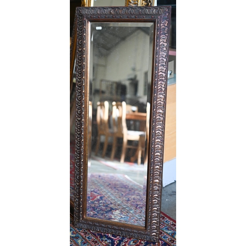 215 - Pair of wall mirrors with bevelled plates and bronzed moulded frames, 42 x 104 cm, to/w two other wa... 