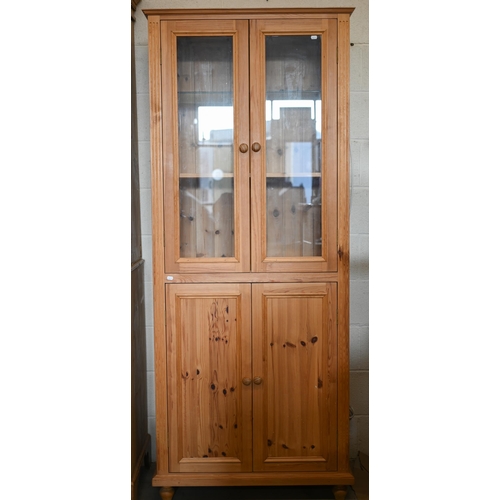 216 - Modern stained pine part-glazed dresser/display cabinet, 82 x 208 x 42 cm