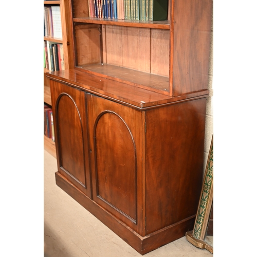 218 - Victorian mahogany chiffonier bookcase with adjustable shelves over a pair of arch panelled cupboard... 