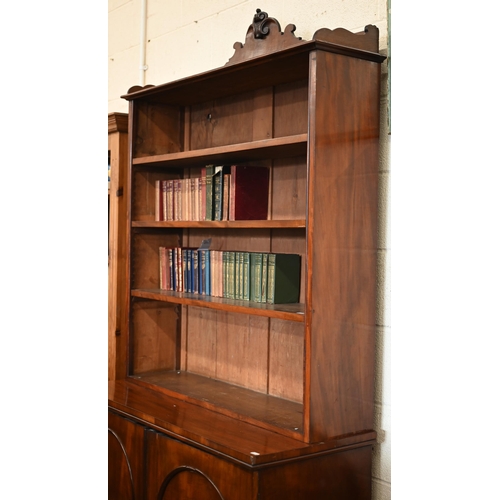 218 - Victorian mahogany chiffonier bookcase with adjustable shelves over a pair of arch panelled cupboard... 