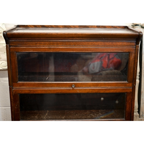 219 - An early 20th century mahogany Globe Wernicke style barrister bookcase with three glazed tiers, 88 x... 