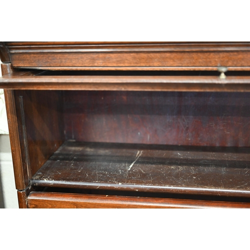 219 - An early 20th century mahogany Globe Wernicke style barrister bookcase with three glazed tiers, 88 x... 