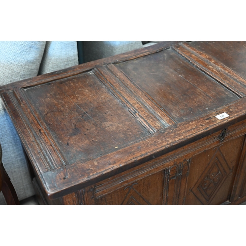 220 - An antique carved oak coffer, traditional panelled construction, 114 x 54 x 68 cm h