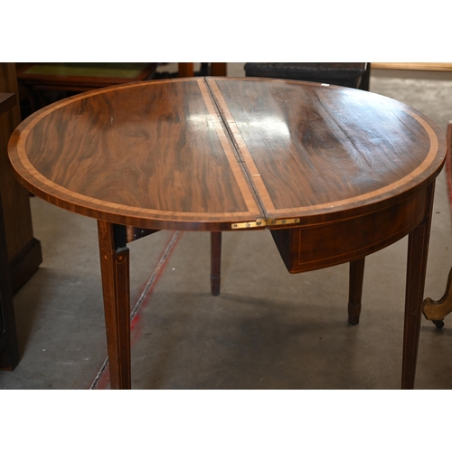 222 - A 19th century mahogany and satin banded demi lune card table with floral marquetry decoration, tape... 