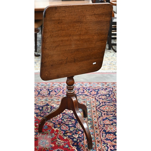 225 - A 19th century mahogany tilt top occasional table on turned column and triform supports, to/w a foot... 