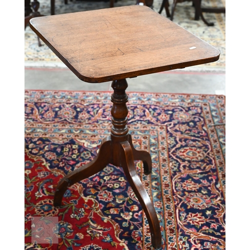 225 - A 19th century mahogany tilt top occasional table on turned column and triform supports, to/w a foot... 