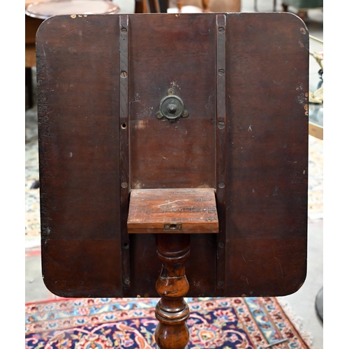 225 - A 19th century mahogany tilt top occasional table on turned column and triform supports, to/w a foot... 