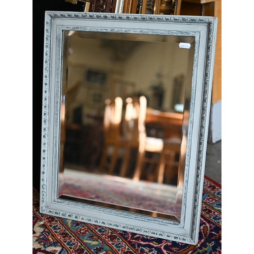 238 - An antique mahogany framed shaving mirror with bevelled glass, vanity box and brass towel rail, 70 x... 