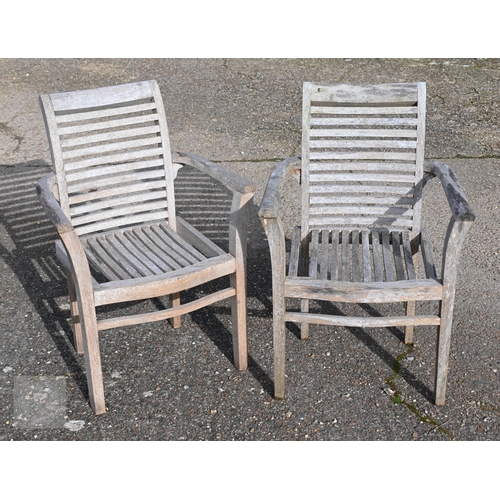 24 - A set of six unbranded weathered teak garden armchairs, some a/f (6)