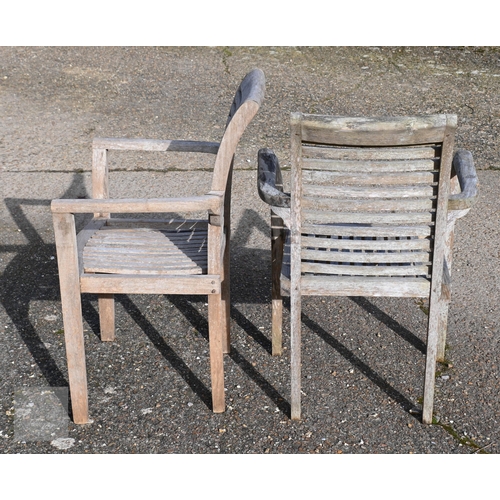 24 - A set of six unbranded weathered teak garden armchairs, some a/f (6)