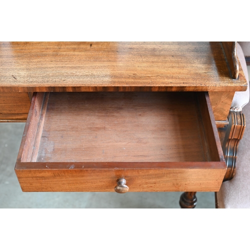 240 - A Victorian mahogany two drawer side table on turned reeded supports and brass castors, 100 x 60 x 8... 