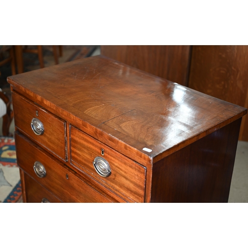 242 - A small 19th century mahogany chest of two short over two long drawers on splayed bracket feet, 76 x... 