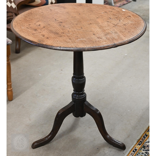 243 - Antique circular oak tilt-top table on tripod base