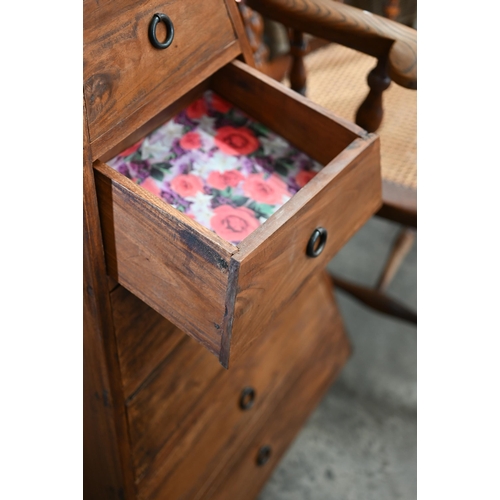 245 - A modern Indian hardwood pyramid chest of seven graduated drawers, 128 cm h