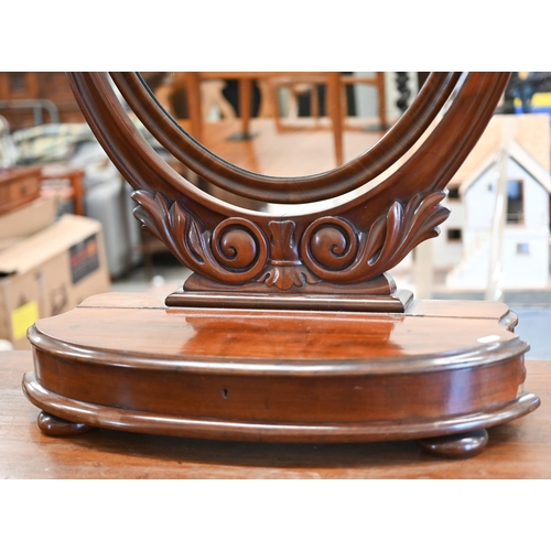 248 - Large Victorian oval mahogany framed dressing table mirror with vanity box platform base on bun feet... 