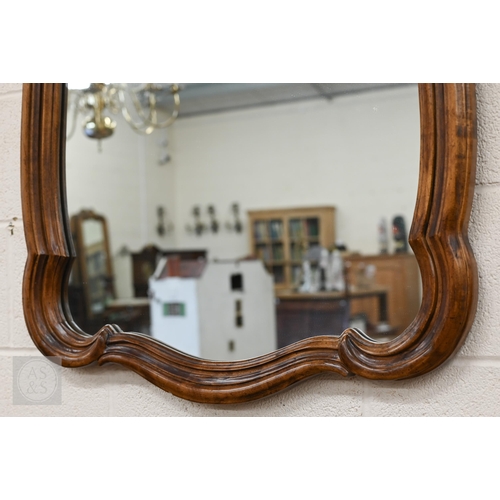 252 - French style wall mirror in moulded hardwood scrolling frame with anthemion crest, 128 x 80 cm