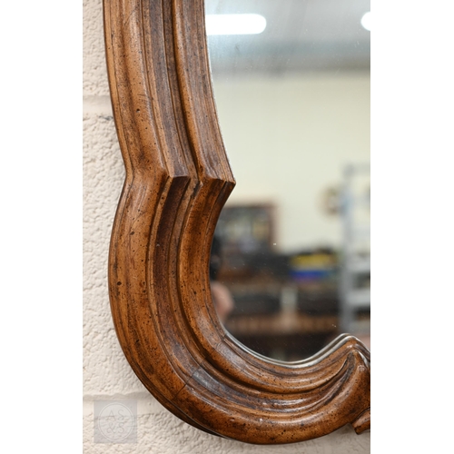 252 - French style wall mirror in moulded hardwood scrolling frame with anthemion crest, 128 x 80 cm