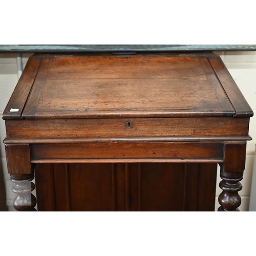 254 - Victorian mahogany slope-top clerk's desk with barley twist pillars, panelled cupboards and single d... 