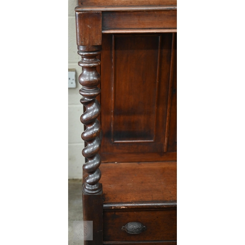 254 - Victorian mahogany slope-top clerk's desk with barley twist pillars, panelled cupboards and single d... 