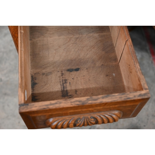 255 - Early 20th century large oak roll-top desk with drawer slide enclosing fitted interior over eight dr... 