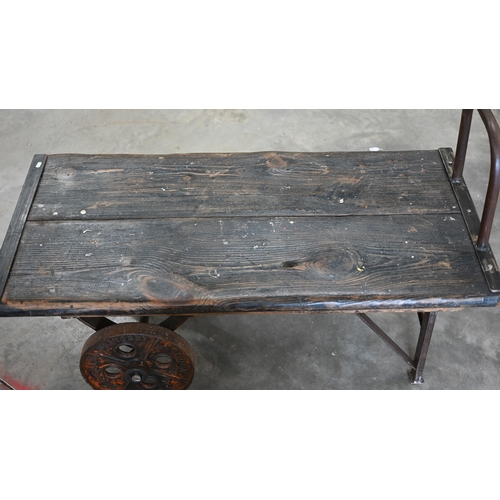 258 - An industrial 'Slingsby' hardwood and cast iron flatbed trolley, 120 x 60 x 78 cm h o/a