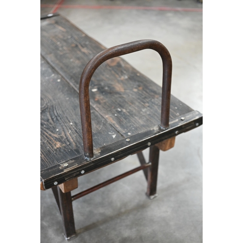 258 - An industrial 'Slingsby' hardwood and cast iron flatbed trolley, 120 x 60 x 78 cm h o/a