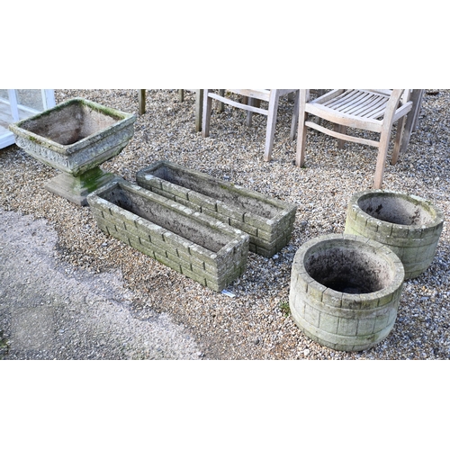 26 - A pair of weathered cast stone trough planters to/w a pair of faux wood cast stone tub planters and ... 