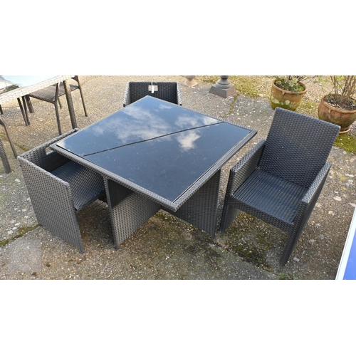 28 - A modern synthetic rattan all-weather garden cube table c/w two cube chairs and a single chair