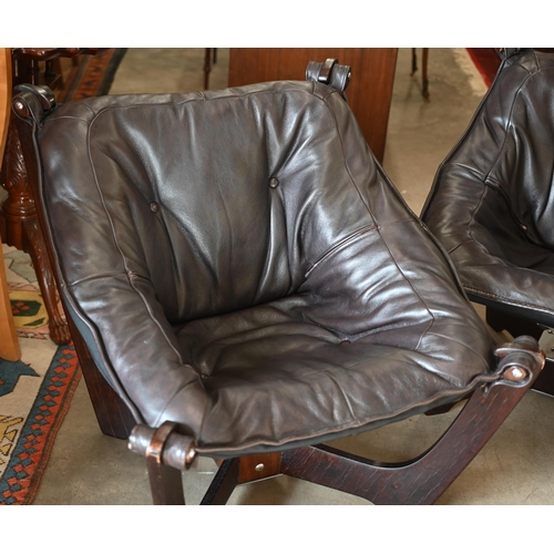 33 - A pair of Odd Knutson design 'Zest' studio chairs for John Lewis, dark brown faux leather on ebonise... 